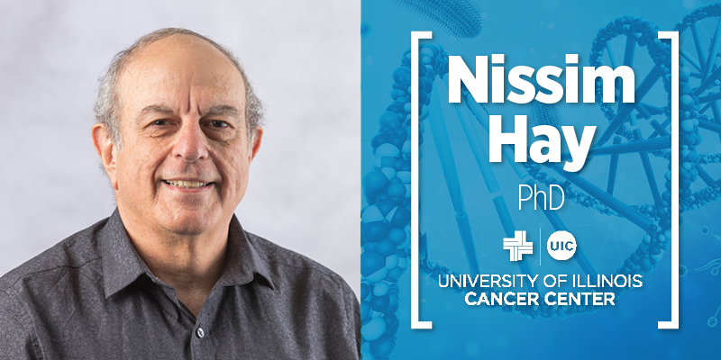 Nissim Hay photo and his name with the UI Cancer Center logo on a blue background