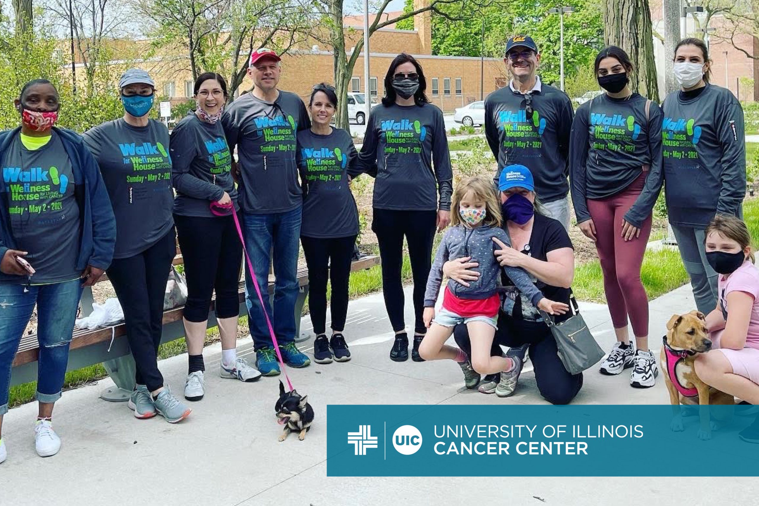 Photo of the Walk for Wellness House team and the University of Illinois Cancer Center logo